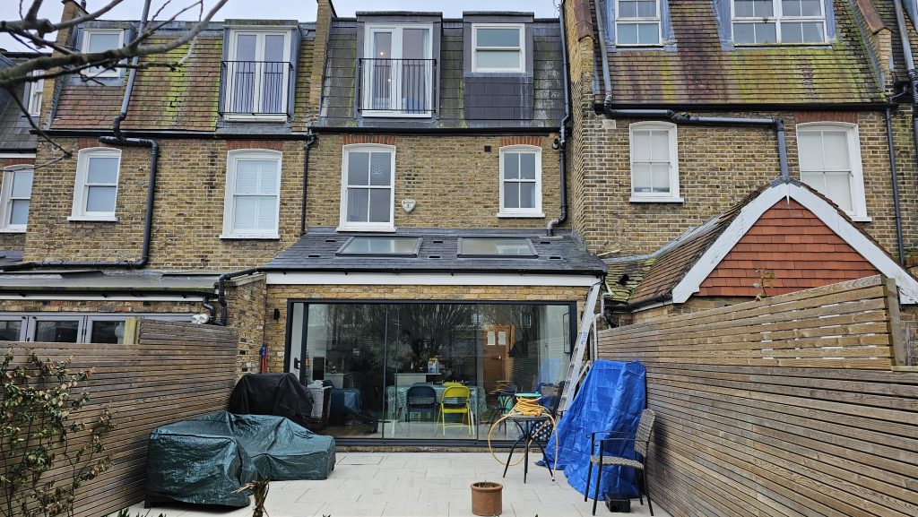 Modern rear house extension completed by SW Loft Extensions in South West London